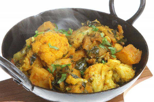 Indian vegetable curry with spinach, cauliflower and potato